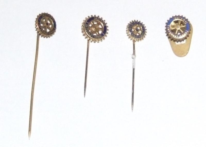 Four Rotary International Lapel Badges