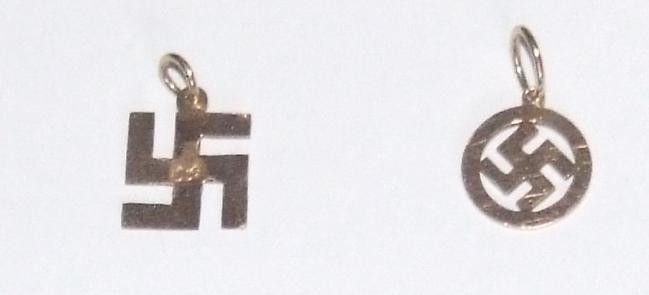 Two Gold Swastika Pendants.